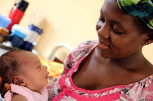 Alice Waterman teaches midwifery student Elizabeth Conteh at the Masuba School of Midwifery; Makeni