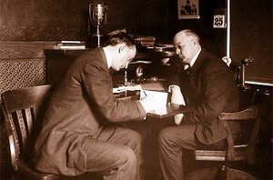 Sir Howard (left) signing his probation papers