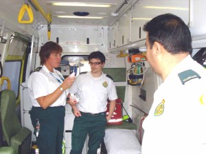 Christine with paramedic James Rousseau and Technician Fak Hussain talk about the Tympanic temperature monitor