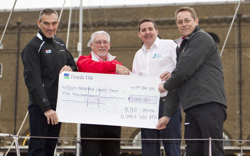 Peter Smith presenting a cheque for £5000 to the Ellen MacArthur Cancer Trust