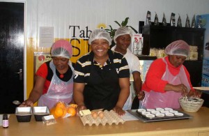 Big Issue sellers baking at the Tabeisa café, Bellville, near Cape Town