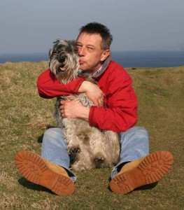 Andy Kershaw with his dog Buster, April 2010. Photo by Vic Bates