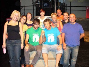 Luke Hopson (centre left) and Simon Burgess (centre right) surrounded by the other principals (from left to right: Lucy Evans, Vivienne Morrison, Annabel Smith, Michelle Burgess, Claire Best, Paul Wescott, James Staley and John Morrison)