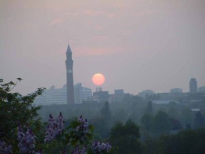 Sun sets behind Birmingham University and Queen Elizabeth Hospital